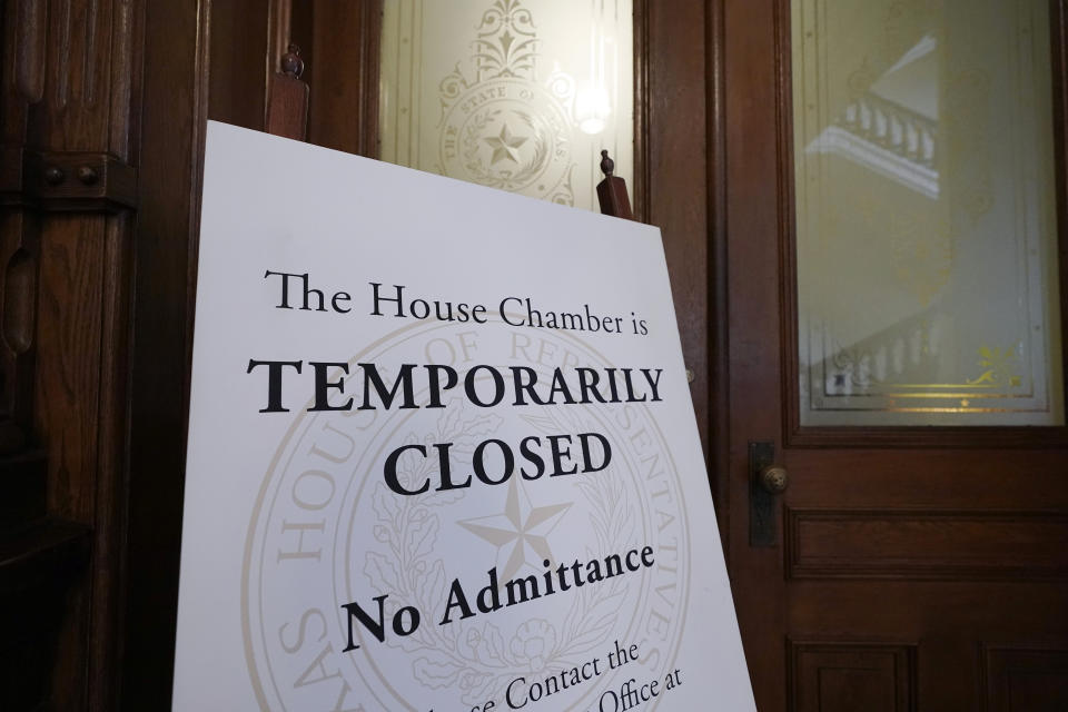 A closed sign blocks entry to the House Chamber at the State Capitol, Tuesday, June 1, 2021, in Austin, Texas. The Texas Legislature closed out its regular session Monday, but are expected to return for a special session after Texas Democrats blocked one of the nation's most restrictive new voting laws with a walkout. (AP Photo/Eric Gay)