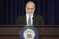 U.S. Federal Reserve Chairman Ben Bernanke pauses during remarks at his final planned news conference before his retirement, at the Federal Reserve Bank headquarters in Washington, December 18, 2013. REUTERS/Jonathan Ernst