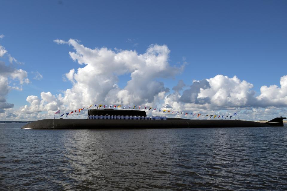 The Russian nuclear-powered cruise missile submarine K-266 Orel attends the military parade during the Navy Day celebration in Kronshtadt outside St.Petersburg, Russia, Sunday, July 26, 2020. (Alexei Druzhinin, Sputnik, Kremlin Pool Photo via AP)