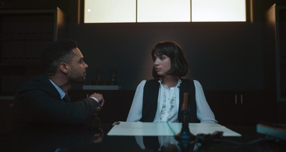 Rege-Jean Page as Carmichael and Ana de Armas as Dani Miranda. (Courtesy of Netflix © 2022)