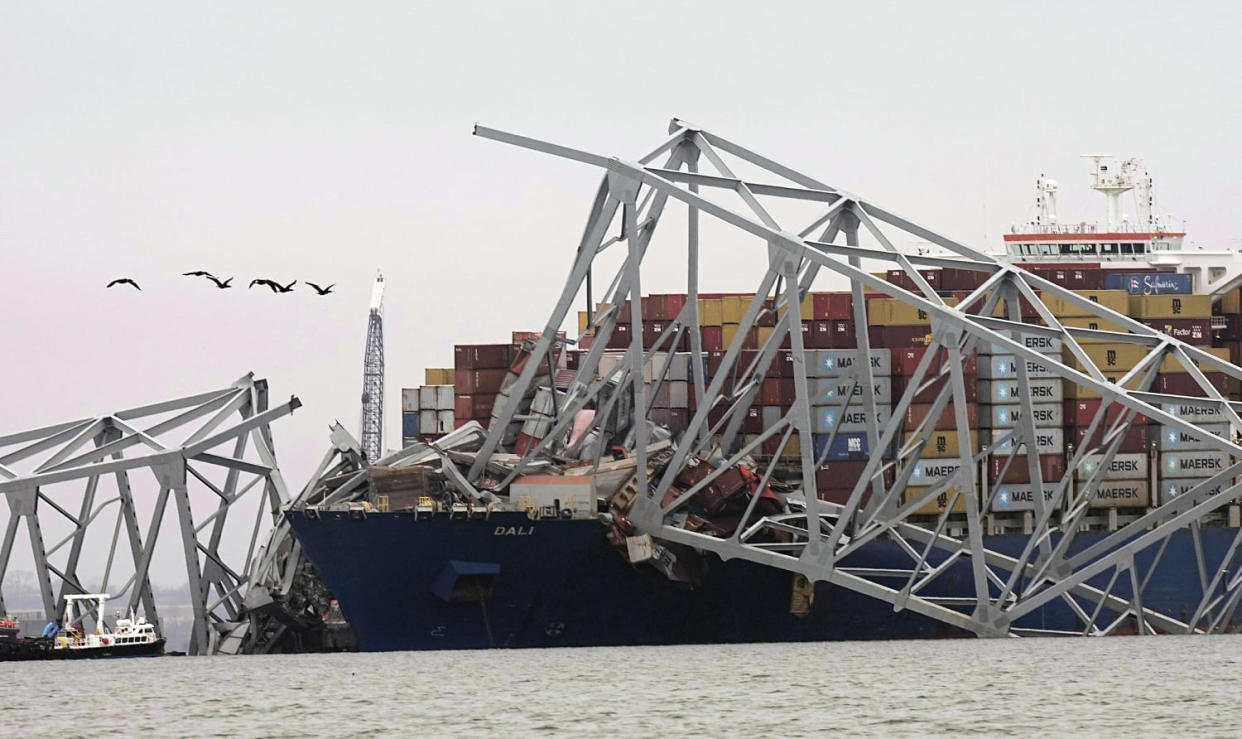 Cargo ship Dali is seen after running into and collapsing the Francis Scott Key Bridge (Steve Helber / AP file)