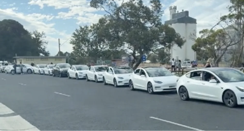 More than 10 electric vehicles are seen queued for a charging station in Keith, South Australia over the weekend. 