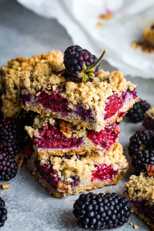 <p>Boulder Locavore</p><p>Oatmeal bars are a homey dessert recipe everyone loves. Fresh blackberries add a delicious sweetness to this easy oatmeal bars recipe.</p><p><strong>Get the recipe: <a href="https://boulderlocavore.com/blackberry-oatmeal-bars/" rel="nofollow noopener" target="_blank" data-ylk="slk:Blackberry Oatmeal Bars;elm:context_link;itc:0;sec:content-canvas" class="link rapid-noclick-resp">Blackberry Oatmeal Bars</a></strong></p>