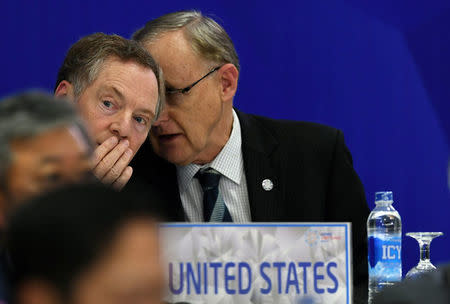 US Trade Representative Robert Lighthizer speaks with an APEC Secretariat official during a joint press conference held on the sideline of the Asia-Pacific Economic Cooperation (APEC)'s 23rd Ministers responsible for Trade Meeting being held in Hanoi, Vietnam May 21, 2017. REUTERS/Hoang Dinh Nam/Pool