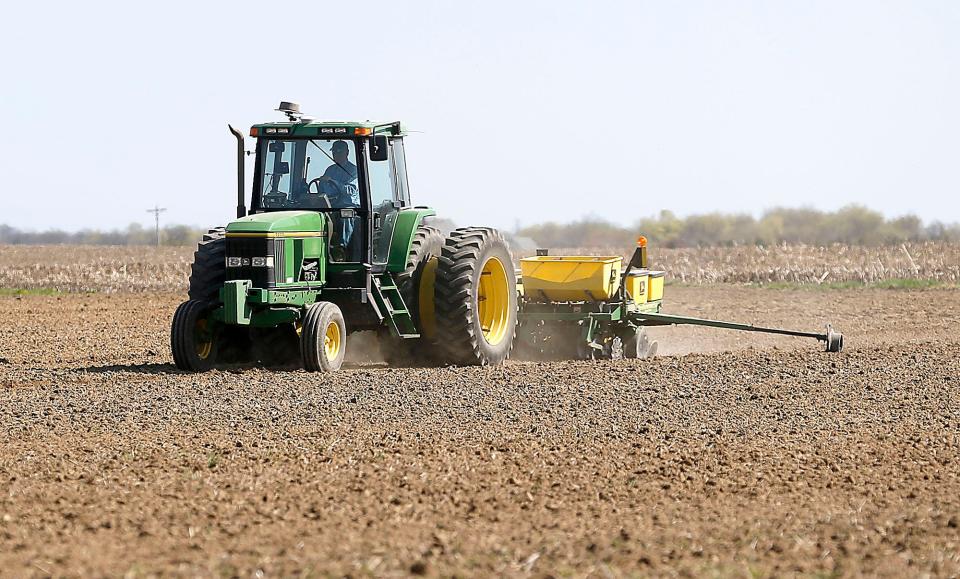 A farmer plants a field on County Road 1775 in Montgomery Township on Ashland County Wednesday, April 19, 2023. TOM E. PUSKAR/ASHLAND TIMES-GAZETTE