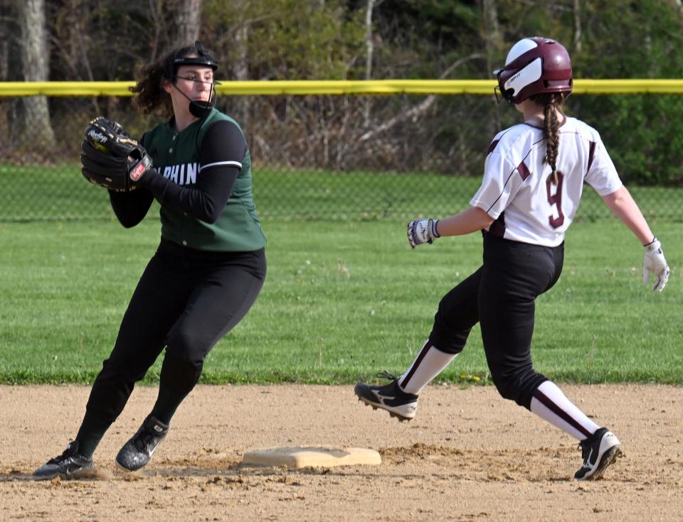 Dennis-Yarmouth second baseman Savannah Azoff attempts to turn a double play after forcing Anna Bennett at second.