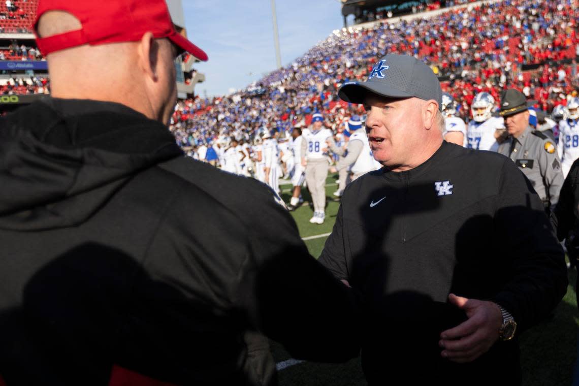 Kentucky coach Mark Stoops shook hands with Louisville head man Jeff Brohm after the Wildcats upset the No. 9 Cardinals 38-31 at L&N Federal Credit Union Stadium in the 2023 regular-season finale for both teams. For Stoops and UK, it was the fifth straight victory over U of L.