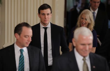 White House aides including Chief of Staff Reince Priebus (L), senior advisors Jared Kushner (C) and Kellyanne Conway arrive with Vice President Mike Pence (R) prior to a joint news conference between Canadian Prime Minister Justin Trudeau and U.S. President Donald Trump at the White House in Washington, U.S., February 13, 2017. REUTERS/Carlos Barria