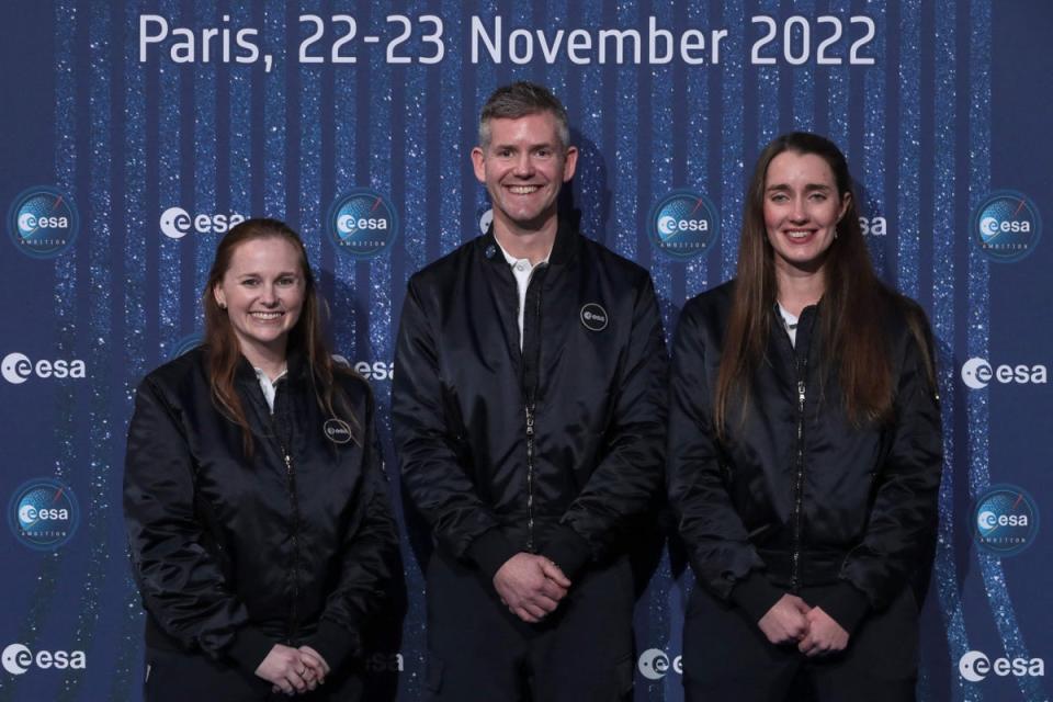 New recruits: Meganne Christian, left, John McFall and Rosemary Coogan are unveiled in Paris (AFP/Getty)