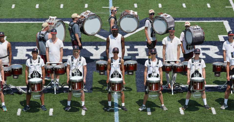 The Cadets perform a preview of their 2023 show during a clinic for high school band members at Mercyhurst University in June. The drum corps' parent organization has suspended competition for 2024.