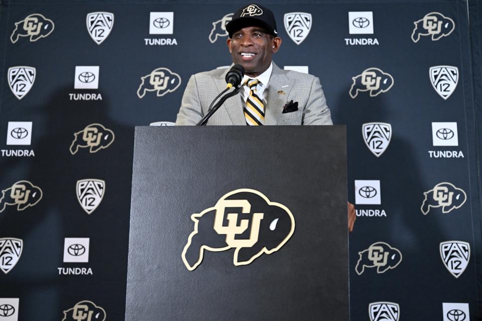 Deion Sanders, CUs new head football coach, talks to a packed audience in the Arrow Touchdown Club during a press conference on December 4, 2022 in Boulder, Colorado. CU held an introductory press conference to announce the hiring of Deion Coach Prime Sanders as the schools new head football coach. Chancellor Phil DiStefano and athletic director Rick George accompanied Sanders into a packed room in the Arrow Touchdown Club inside the Dal Ward Athletic Center. Sanders becomes the 28th head coach in Buffalo football history. Sanders, who known as Prime Time during his Hall of Fame playing career has since transitioned into Coach Prime as a head football coach. Sanders, 55, joins the CU program from Jackson State University where in three seasons the Tigers compiled a 27-5 record and won back-to-back Southwestern Athletic Conference championships.