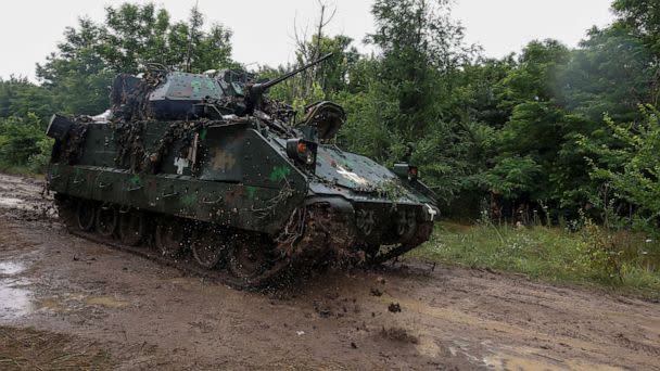 PHOTO: A Ukrainian serviceman of the 47th Magura Separate Mechanized Brigade drives a M2 Bradley infantry fighting vehicle at a position near a front line, in Zaporizhzhia region, Ukraine, on June 26, 2023. (Serhii Nuzhnenko/Reuters)