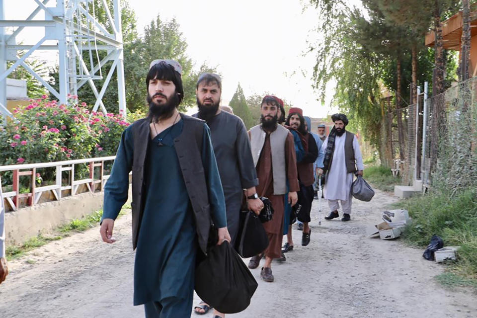 Taliban prisoners are released from Pul-e-Charkhi jail in Kabul, Afghanistan, Thursday, Aug. 13, 2020. Afghanistan released the first 80 of a final 400 Taliban prisoners, paving the way for negotiations between the warring sides in Afghanistan’s protracted conflict, the government said Friday, Aug. 14, 2020. (Afghanistan's National Security Council via AP)