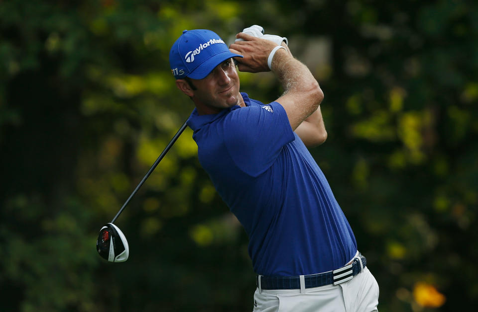 CARMEL, IN - SEPTEMBER 07: Dustin Johnson watches his tee shot on the 12th hole during the second round of the BMW Championship at Crooked Stick Golf Club on September 7, 2012 in Carmel, Indiana. (Photo by Scott Halleran/Getty Images)