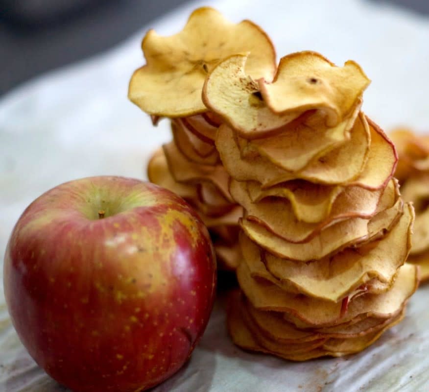 <p>Living Sweet Moments</p><p>Easy to make and delicious! The oven does the hard work. Make this apple chips recipe at home, kid-friendly and customizable. </p><p><strong>Get the recipe: <em><a href="https://livingsweetmoments.com/homemade-crunchy-apple-chips-recipe-dehydrator-needed/" rel="nofollow noopener" target="_blank" data-ylk="slk:Homemade Crunchy Apple Chips;elm:context_link;itc:0;sec:content-canvas" class="link ">Homemade Crunchy Apple Chips</a></em></strong></p>