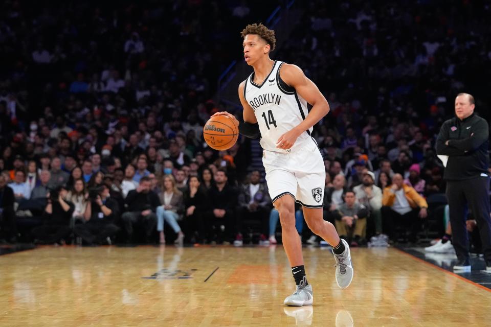 Apr 6, 2022; New York, New York, USA; Brooklyn Nets small forward Kessler Edwards (14) dribbles the ball up the court against the New York Knicks during the first half at Madison Square Garden. Mandatory Credit: Gregory Fisher-USA TODAY Sports