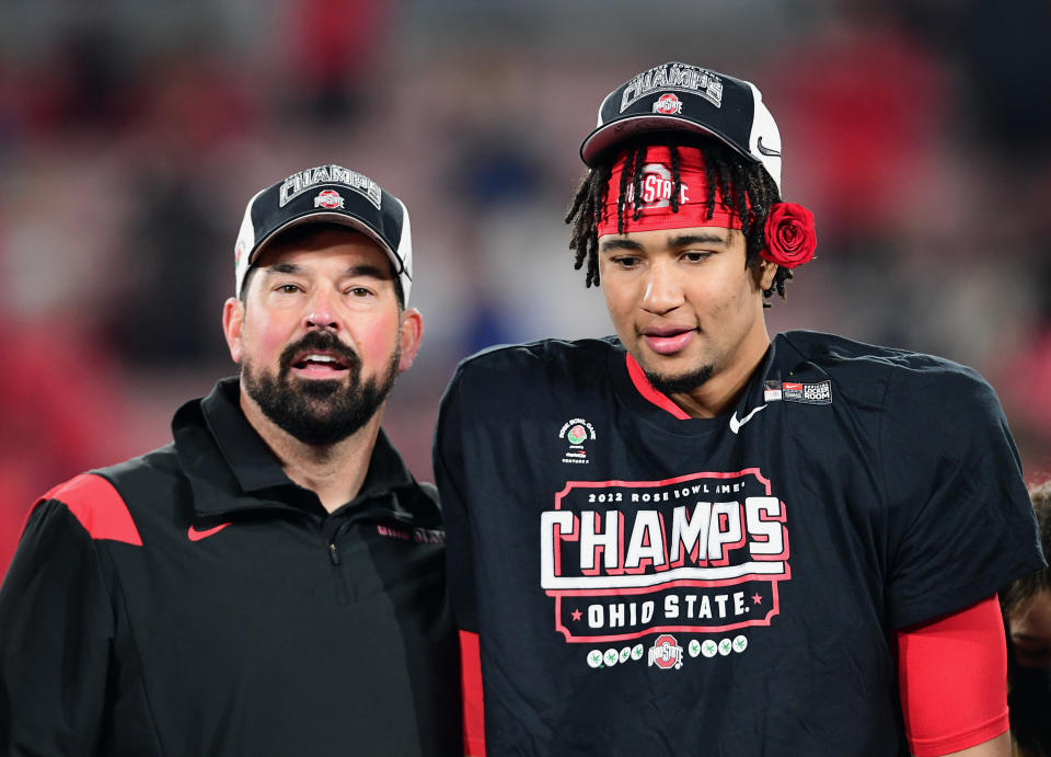 PASADENA, CA - JANUARY 01: Ohio State Buckeyes Head Coach Ryan Day with quarterback C.J. Stroud (7) on the stage after the Buckeyes defeated the Utah Utes 48 to 45 to become the Rose Bowl Champions in a bowl game played on January 1, 2022 at the Rose Bowl in Pasadena CA. (Photo by John Cordes/Icon Sportswire via Getty Images)