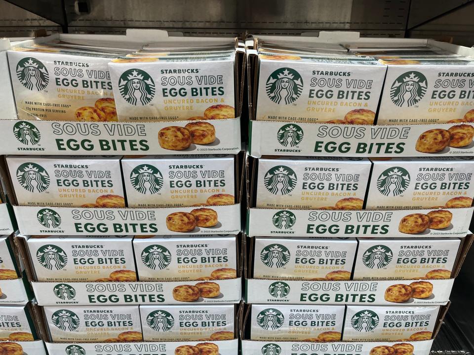 The Starbucks sous-vide egg bites stacked in boxes in a Costco endcap display