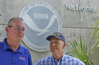 National Hurricane Center director Ken Graham, left, speaks during a news conference along with Sen. Rick Scott, R-Fla.,Tuesday, June 1, 2021, at the center in Miami. Tuesday marks the start of the 2021 Atlantic hurricane season which runs to Nov. 30. (AP Photo/Wilfredo Lee)