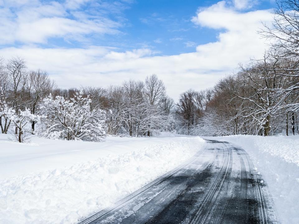 A road just plowed after a large snowfall in rural Central New Jersey.