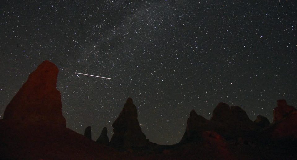 Meteor passing over the Trona Pinnacles, near Death Valley, during the annual Perseid meteor showers in 2019.