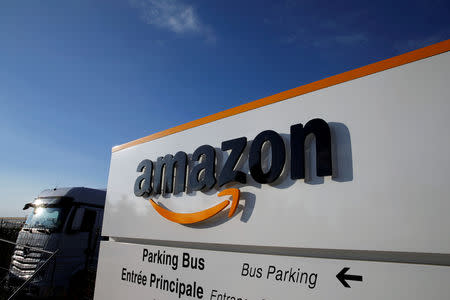 FILE PHOTO: The logo of Amazon is seen at the company logistics centre in Boves, France, August 8, 2018. REUTERS/Pascal Rossignol/File Photo