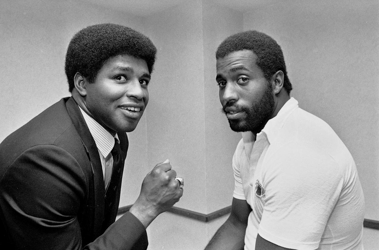 Brig Owens, left, commissioner of The Players All-Star Season and Dennis Harrison, Philadelphia Eagles alternate player representative, talk together at a news conference Sept. 30, 1982, in Philadelphia. Owens died Tuesday, June 21, 2022, at age 79.