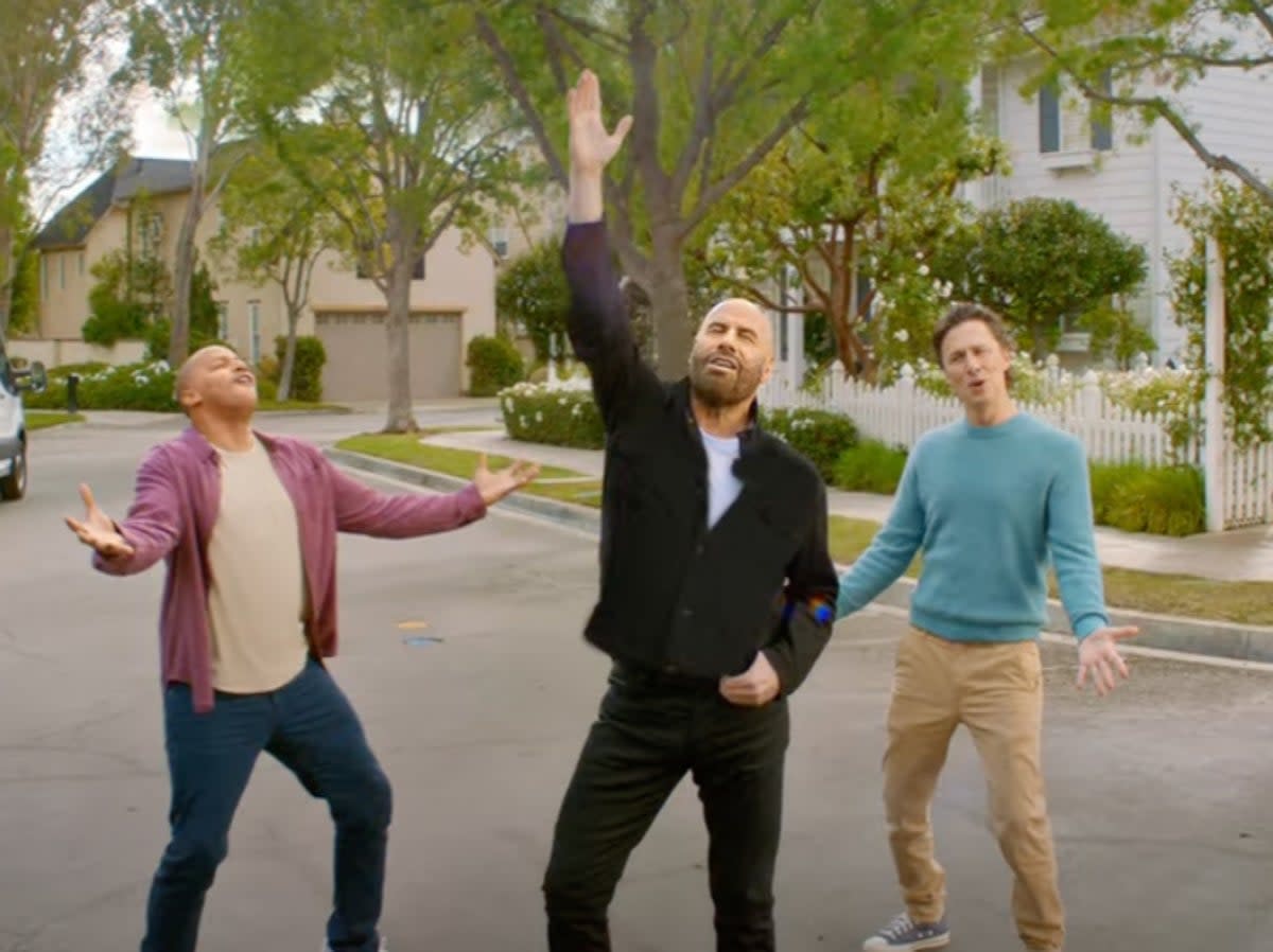 John Travolta spoofs hit 'Grease' song in new Super Bowl commercial with  Zach Braff and Donald Faison