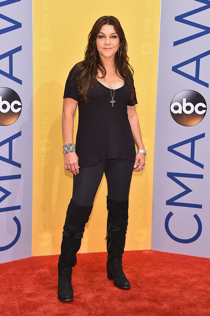 Gretchen Wilson went casual in a black T-shirt and suede boots