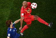 <p>Japan’s forward Yuya Osako (L) challenges Belgium’s defender Vincent Kompany during the Russia 2018 World Cup round of 16 football match between Belgium and Japan at the Rostov Arena in Rostov-On-Don on July 2, 2018. (Photo by Jewel SAMAD / AFP) </p>