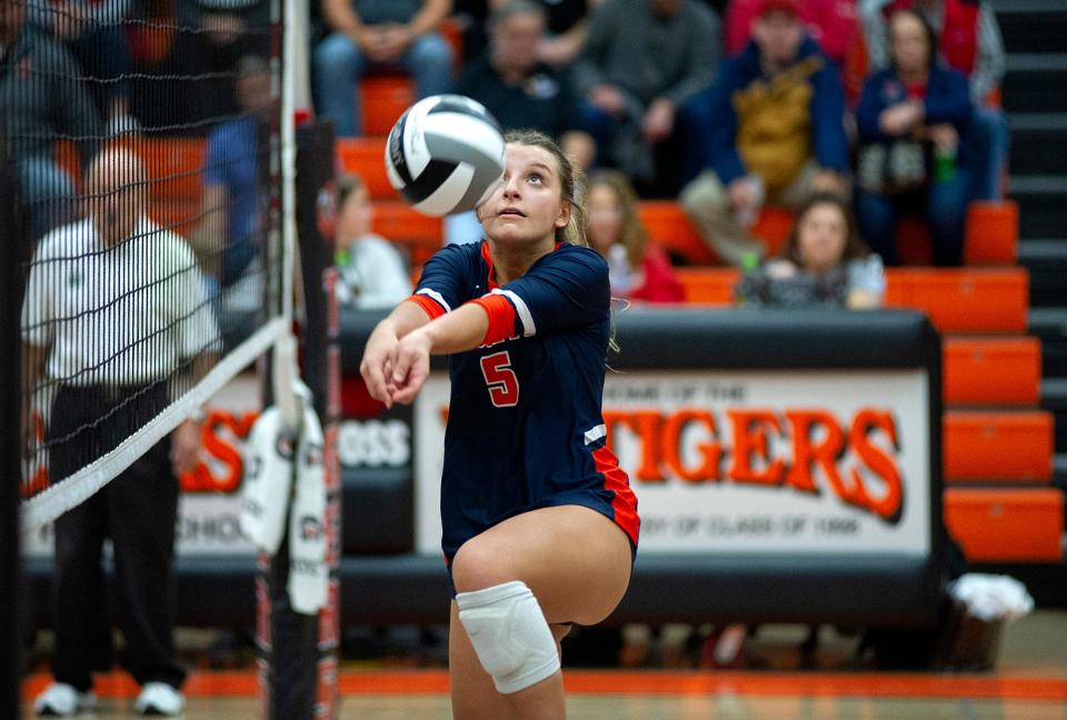 Galion's Ella Payne hits the ball.