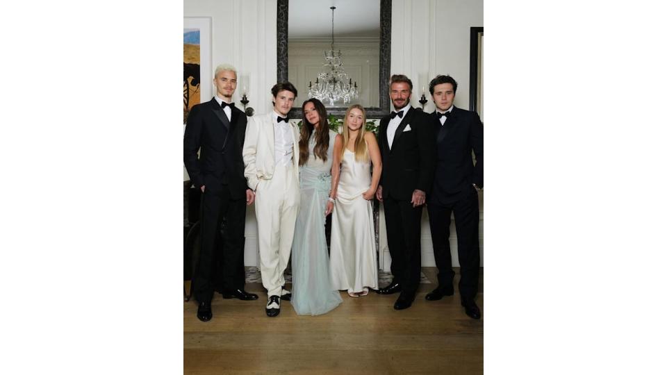 The Beckham family pose in black tie attire at Victoria's 50th birthday party