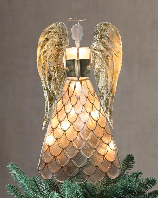 <p><a href="https://go.redirectingat.com?id=74968X1596630&url=https%3A%2F%2Fwww.balsamhill.com%2Fp%2Fcapiz-angel-lighted-tree-topper%3Fsku%3D4002121&sref=https%3A%2F%2Fwww.housebeautiful.com%2Fentertaining%2Fholidays-celebrations%2Fg45735039%2Fchristmas-tree-topper-ideas%2F" rel="nofollow noopener" target="_blank" data-ylk="slk:Shop Now;elm:context_link;itc:0;sec:content-canvas" class="link ">Shop Now</a></p><p>Capiz Angel Lighted Tree Topper</p><p>balsamhill.com</p><p>$129.00</p>