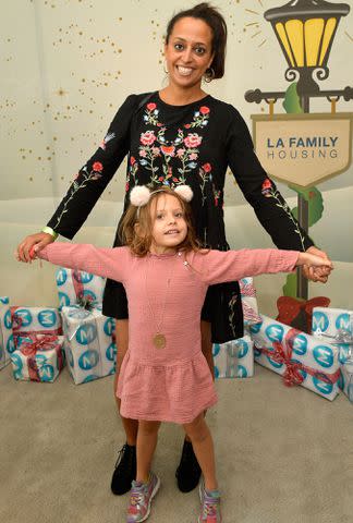 <p>Matt Winkelmeyer/Getty</p> Chudney Ross and daughter Callaway Lane at the 7th Annual Santa's Secret Workshop benefiting LA Family Housing on December 2, 2017 in West Hollywood, California.