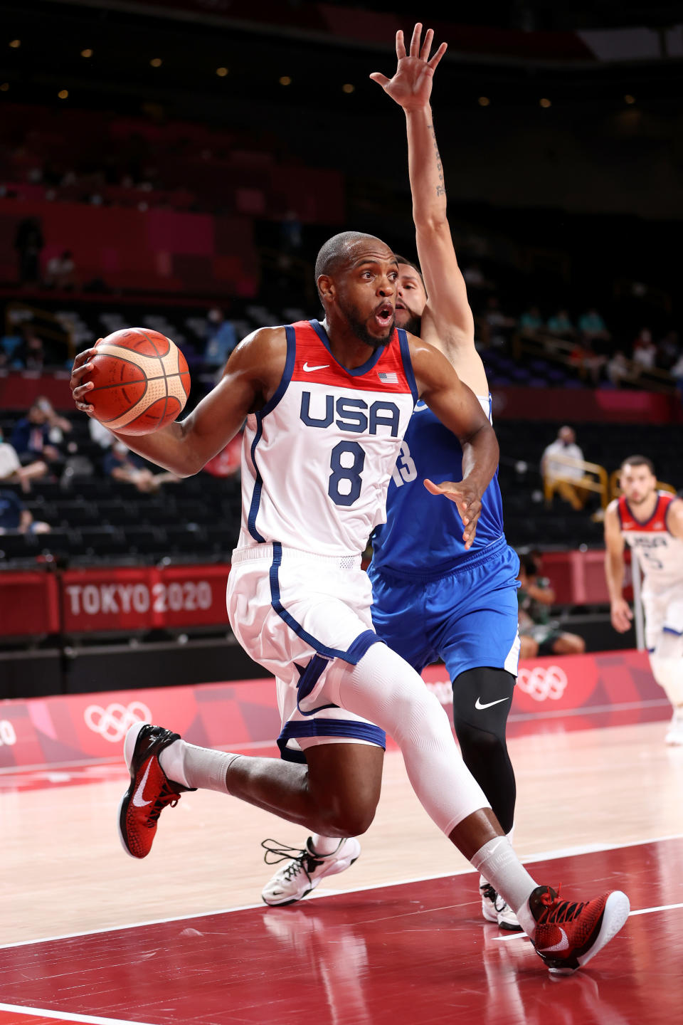 <p>SAITAMA, JAPAN - JULY 31: Khris Middleton #8 of Team United States drives to the basket Czech Republic during the first half of a Men's Basketball Preliminary Round Group A game on day eight of the Tokyo 2020 Olympic Games at Saitama Super Arena on July 31, 2021 in Saitama, Japan. (Photo by Gregory Shamus/Getty Images)</p> 