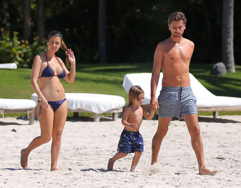 EXCLUSIVE: **PREMIUM RATES APPLY**Kourtney Kardashian and Scott Disick kiss on beach and play with Mason in Mexico first vacation since baby Penelope