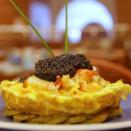 <p>We’ve always been told that breakfast is the most important meal of the day, so why not start it off with a $1,000 frittata? At <a href="https://www.tripadvisor.com/Restaurant_Review-g60763-d425552-Reviews-Norma_s-New_York_City_New_York.html" rel="nofollow noopener" target="_blank" data-ylk="slk:Norma’s;elm:context_link;itc:0;sec:content-canvas" class="link ">Norma’s</a> in New York City, the classic egg dish gets a luxurious twist with the addition of 10 ounces of caviar and a pound of lobster. If you’re not ready to fork over that chunk of change, Norma’s also offers a petite version at a more reasonable $100.</p>