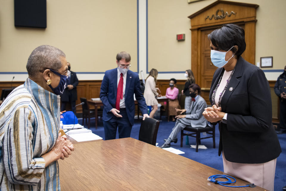 Del. Eleanor Holmes Norton, D-D.C., left, talks with Washington, D.C., Mayor Muriel Bowser, before the start of the House Oversight and Reform Committee hearing, Monday, March 22, 2021 on Capitol Hill in Washington. (Caroline Brehman/Pool via CQ Roll Call)