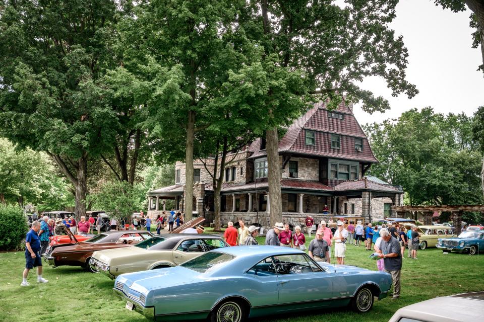 Attendees enjoy viewing beautiful classic cars at the 2023 Concours d’Elegance at Copshaholm. This year's event will be held July 13, 2024, at Copshaholm in South Bend.
