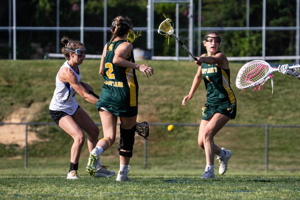 Charter School of Wilmington battle for a loose ball against Saint Mark's during the first-round game in the DIAA Girls Lacrosse Tournament at Charter of Wilmington, Wednesday, May 17, 2023. Charter won 16-9. 