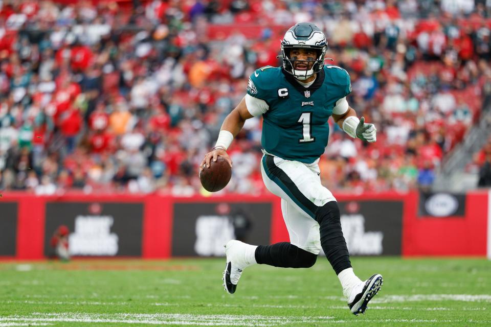 Philadelphia Eagles quarterback Jalen Hurts looks to pass the ball in the second half against the Tampa Bay Buccaneers in an NFC wild-card playoff game.