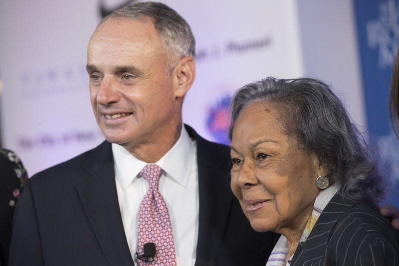 Major League Baseball Commissioner Robert D. Manfred, Jr., left, poses with Rachel Robinson, widow of Jackie Robinson, during a ceremonial ground breaking for the Jackie Robinson Museum, Thursday in New York. AP Photo/MARY ALTAFFER