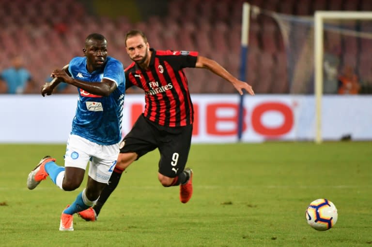 Senegalese defender Kalidou Koulibaly helped stifle Argentine forward Gonzalo Higuain as Napoli fought back to beat Milan