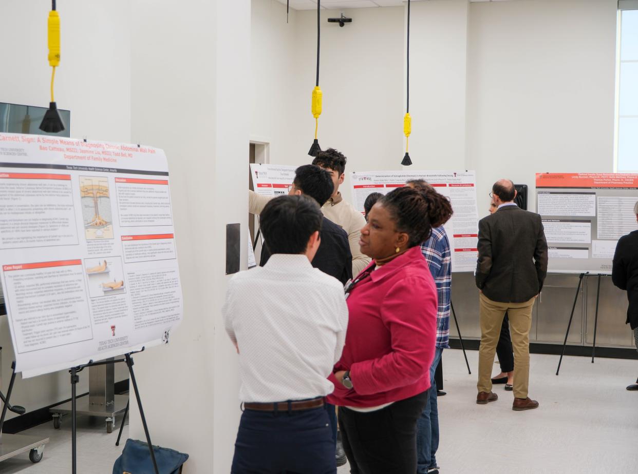 Students and professors collaborate at the inaugural Amarillo Research Symposium Friday at the Texas Tech School of Veterinary Medicine in Amarillo.