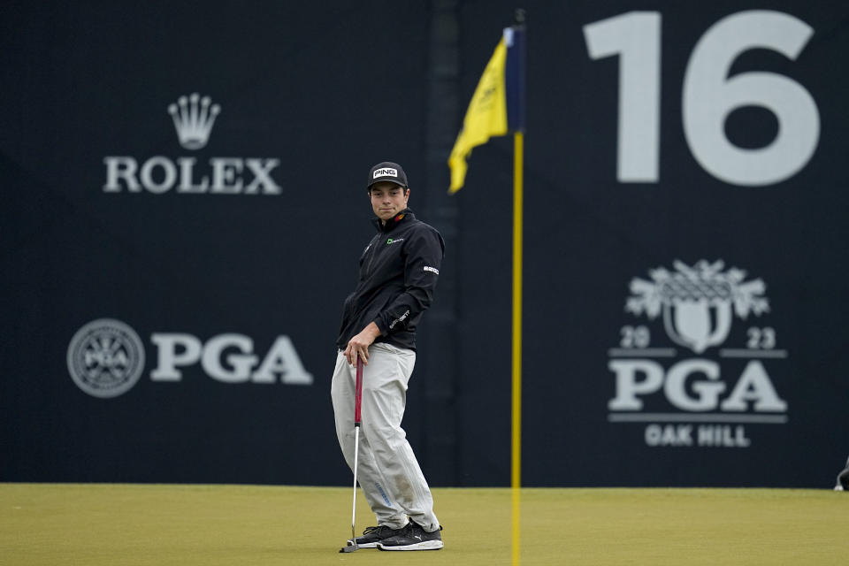 Viktor Hovland, of Norway, and reacts after missing a putt on the 16th hole during the third round of the PGA Championship golf tournament at Oak Hill Country Club on Saturday, May 20, 2023, in Pittsford, N.Y. (AP Photo/Abbie Parr)