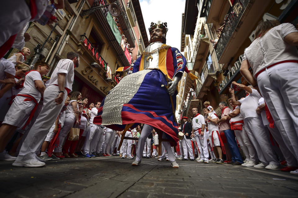 A giant member of San Fermin Comparsa Parade take part in a procession at the San Fermin Festival in Pamplona, northern Spain, July 7, 2019. (Photo: Alvaro Barrientos/AP)