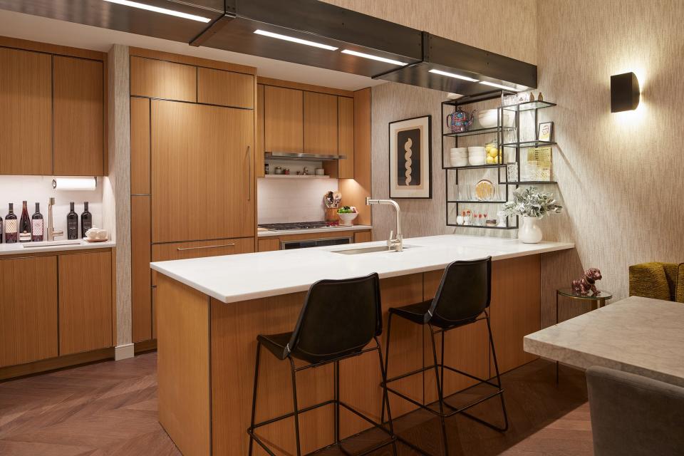 Jesse Tyler Ferguson is writing his first cookbook, so he spends many a night recipe testing in the New York City kitchen the actor shares with his husband, lawyer Justin Mikita. Designer Peter Gurski retrofitted the existing cabinets with help from Castro Renovation and added Kallista faucets.