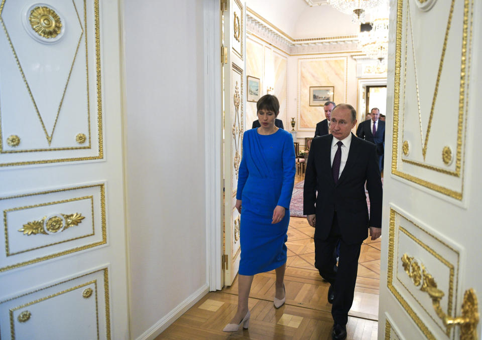 Russian President Vladimir Putin, right, and Estonia's President Kersti Kaljulaid walk inside the Kremlin in Moscow, Russia, Thursday, April 18, 2019.Thursday's meeting between the presidents of Russia and Estonia is the first one for the leaders of the two neighboring countries in nearly a decade. (Alexei Druzhinin, Sputnik, Kremlin Pool Photo via AP)