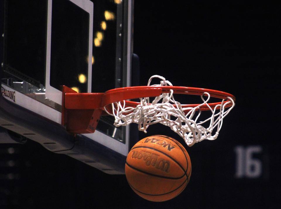 STOCK | A basketball falls through the hoop during Ponte Vedra High School boys basketball practice at the University of North Florida in Jacksonville on February 29, 2024. [Clayton Freeman/Florida Times-Union]