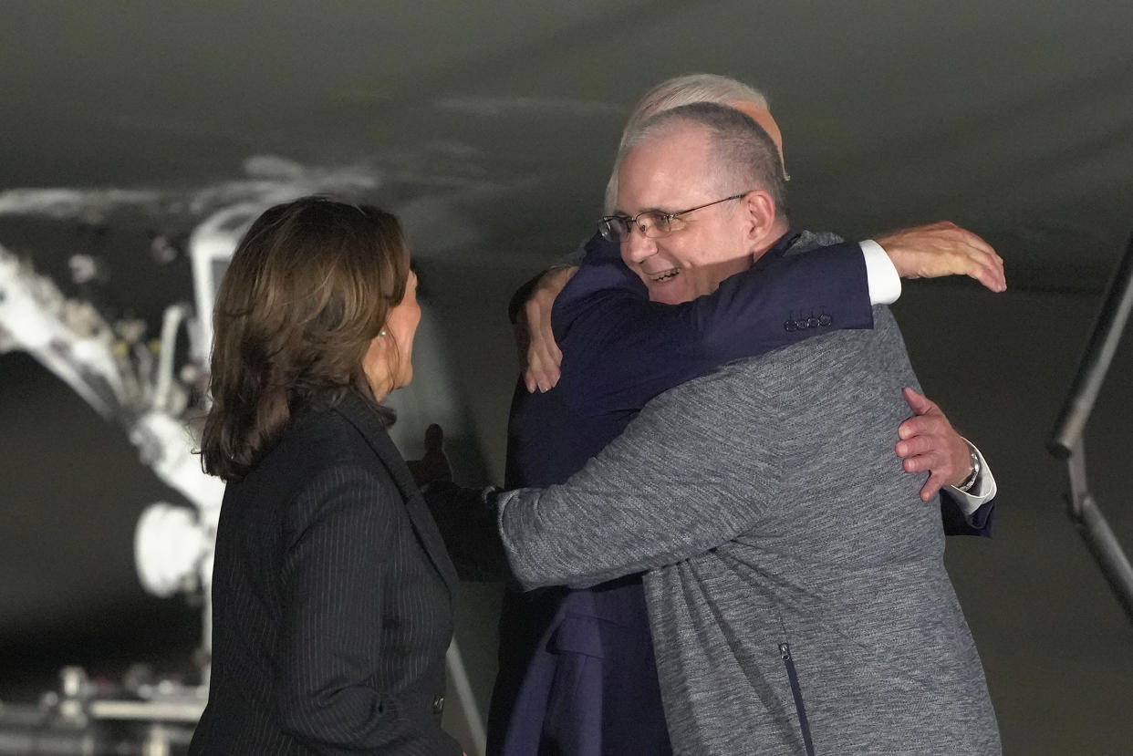 Whelan greets Biden and Harris at Joint Base Andrews.